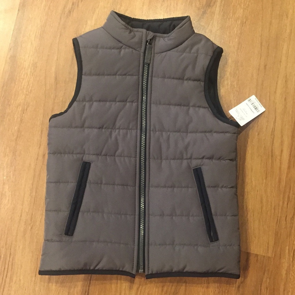 Brand new boys carter’s puffer vest.